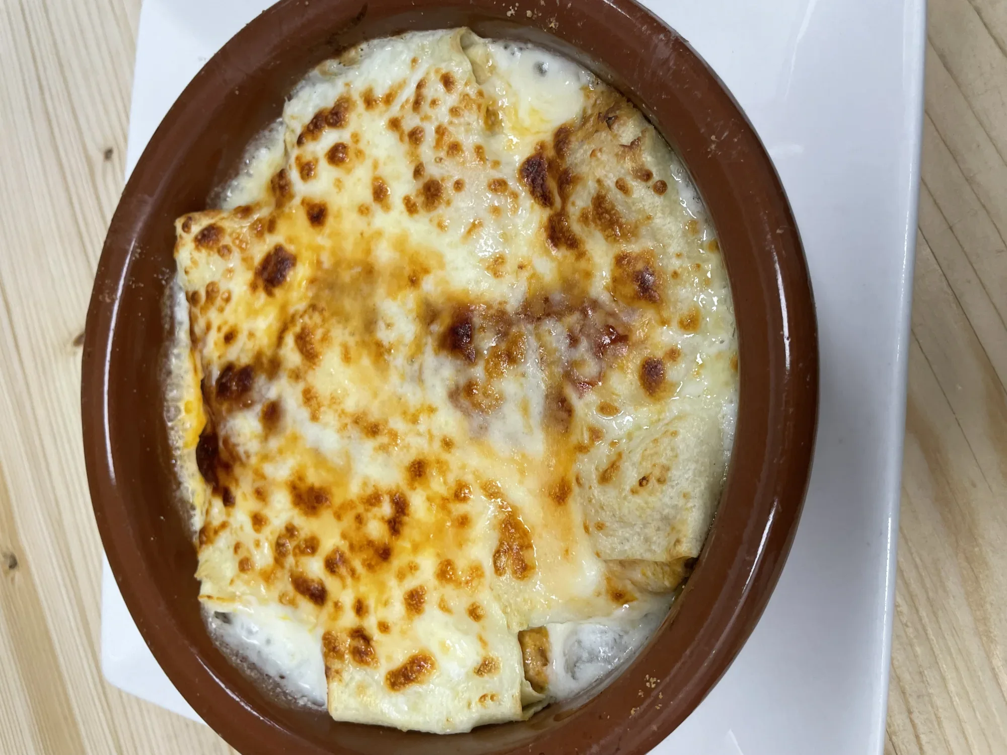 Beef-filled Cannelloni alla Spoletina with béchamel and black truffle