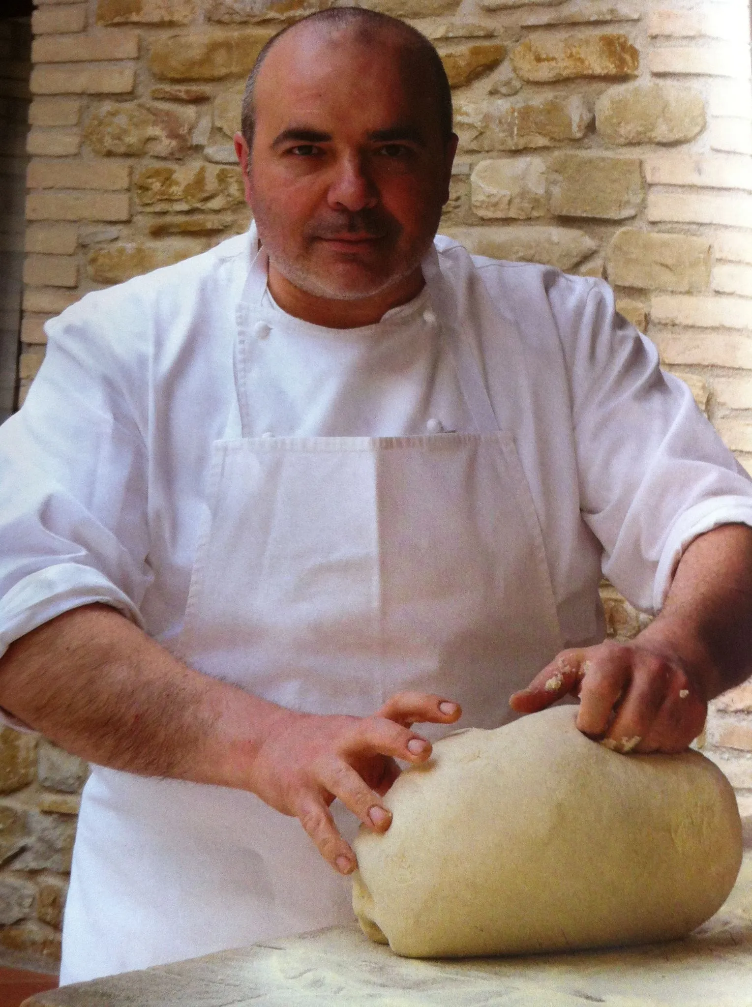 Chef Roberto Crescini making fresh dough