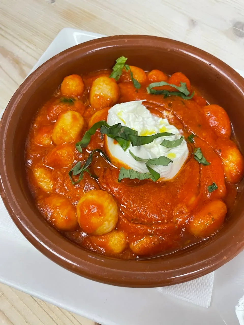 Potato gnocchi in marinara with basil and burrata at Davanti