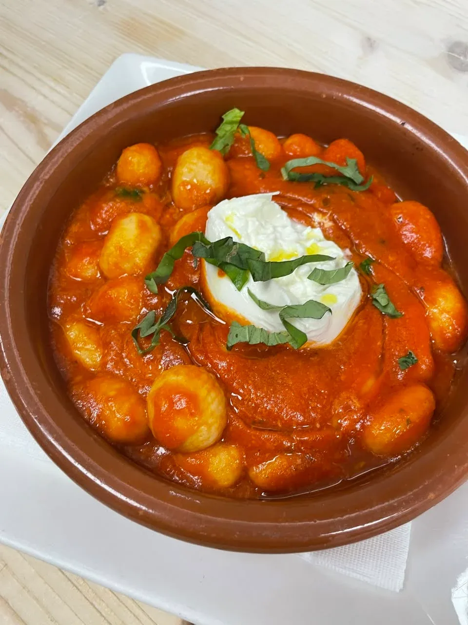 Potato gnocchi in marinara with basil and burrata at Davanti