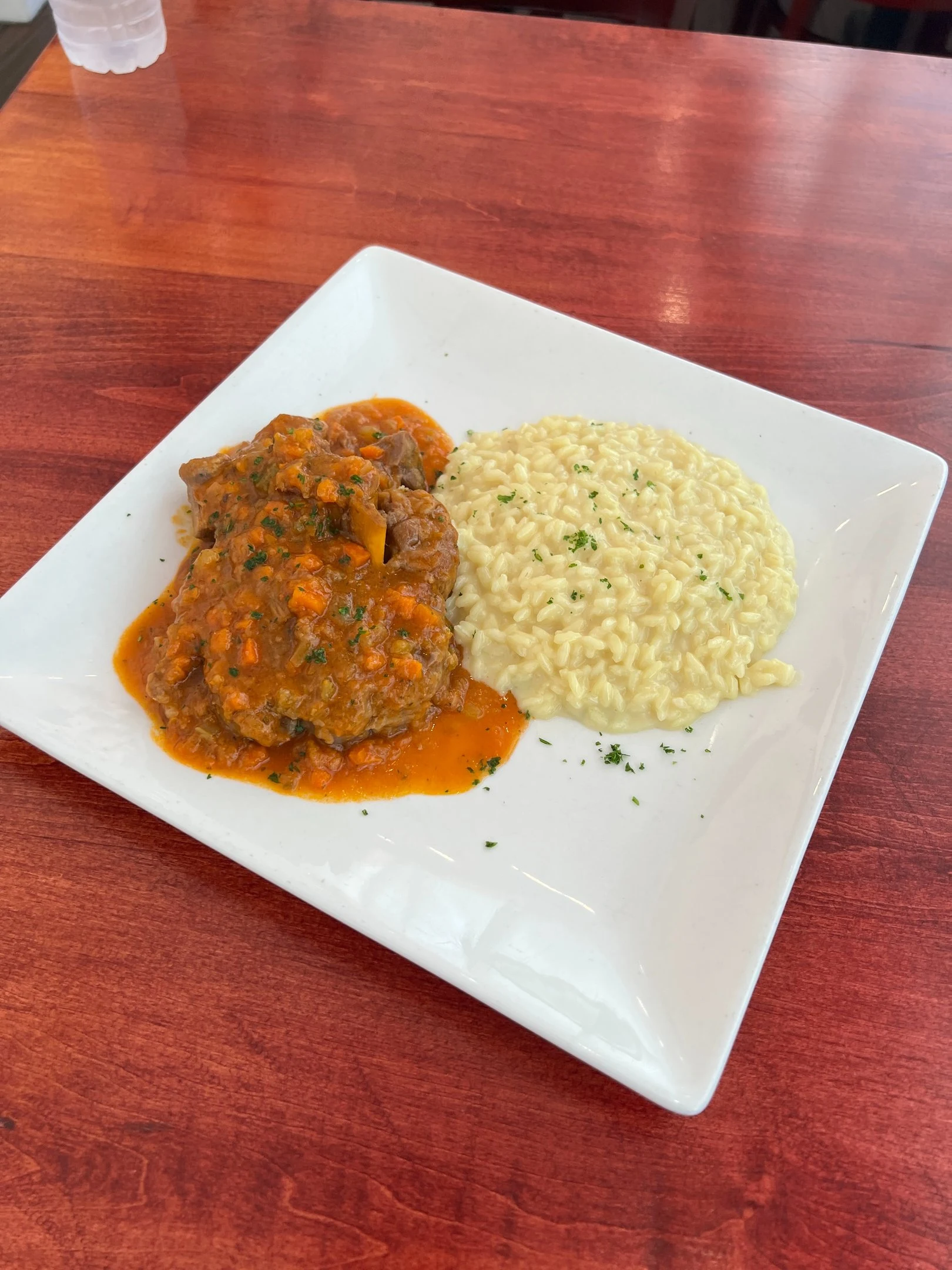 Osso buco and risotto prepared at Davanti