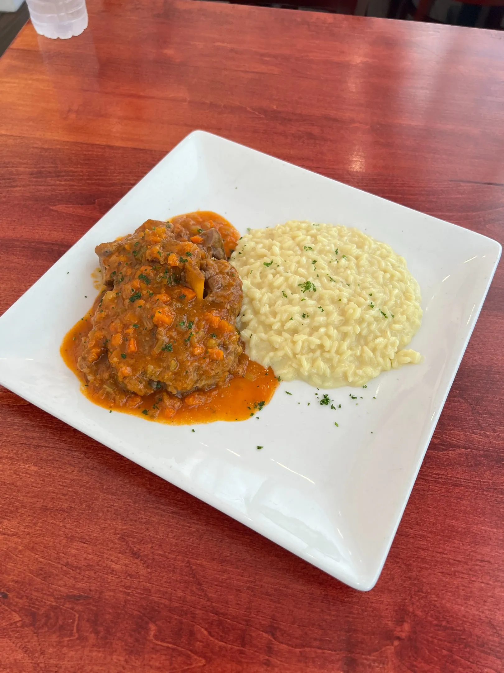 Osso buco and risotto prepared at Davanti