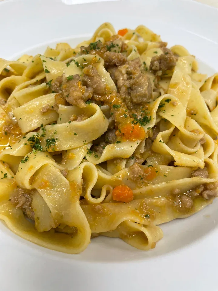Archive view of Tagliatelle al Ragù Bianco di Cinta Senese plated at Davanti
