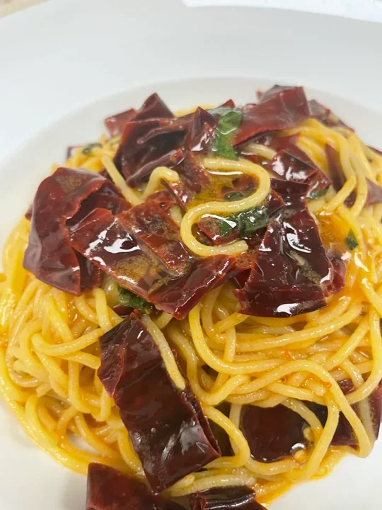Hero archive view of Spaghetti alla Trappitara plated at Davanti