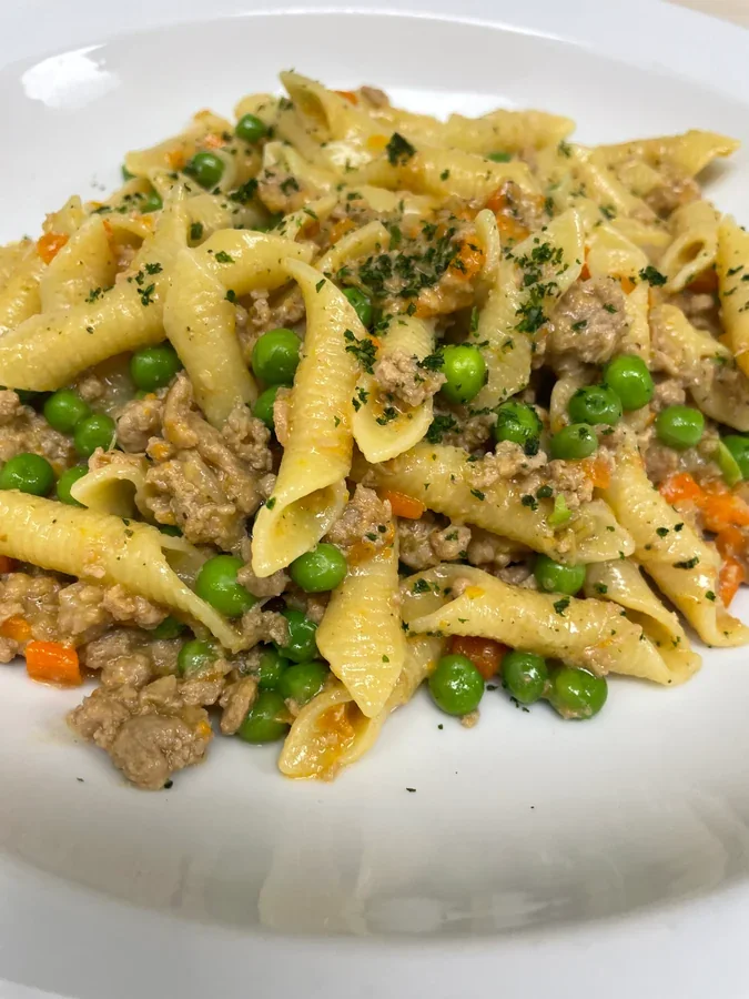 Hero archive view of Garganelli al Ragù Bianco di Vitello plated at Davanti