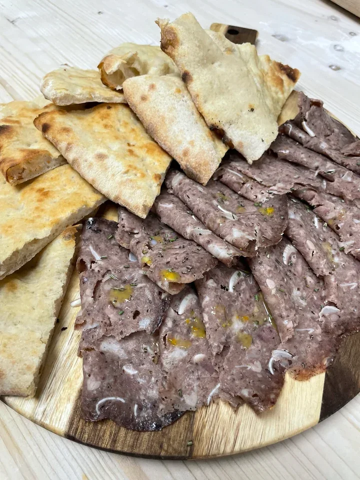 Archive view of Focaccia Bianca con Coppa di Testa di Norcia plated at Davanti