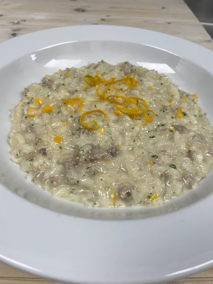 Archive view of Risotto al Taleggio, Salsiccia, Zucca e Arancia plated at Davanti