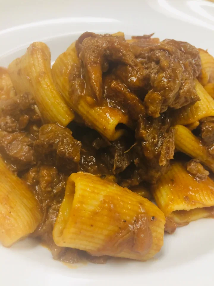Archive view of Rigatoni al Sugo di Guancia di Manzo e Cantarelli plated at Davanti