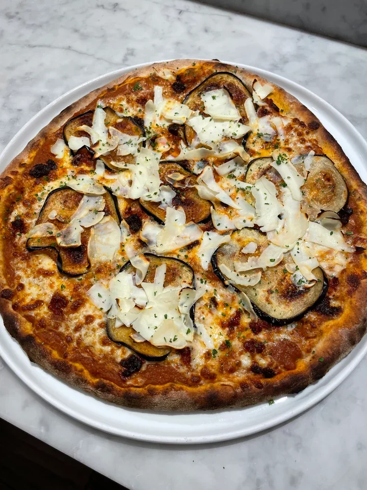 Archive view of Pizza con Melanzane e ’Nduja di Spilinga plated at Davanti