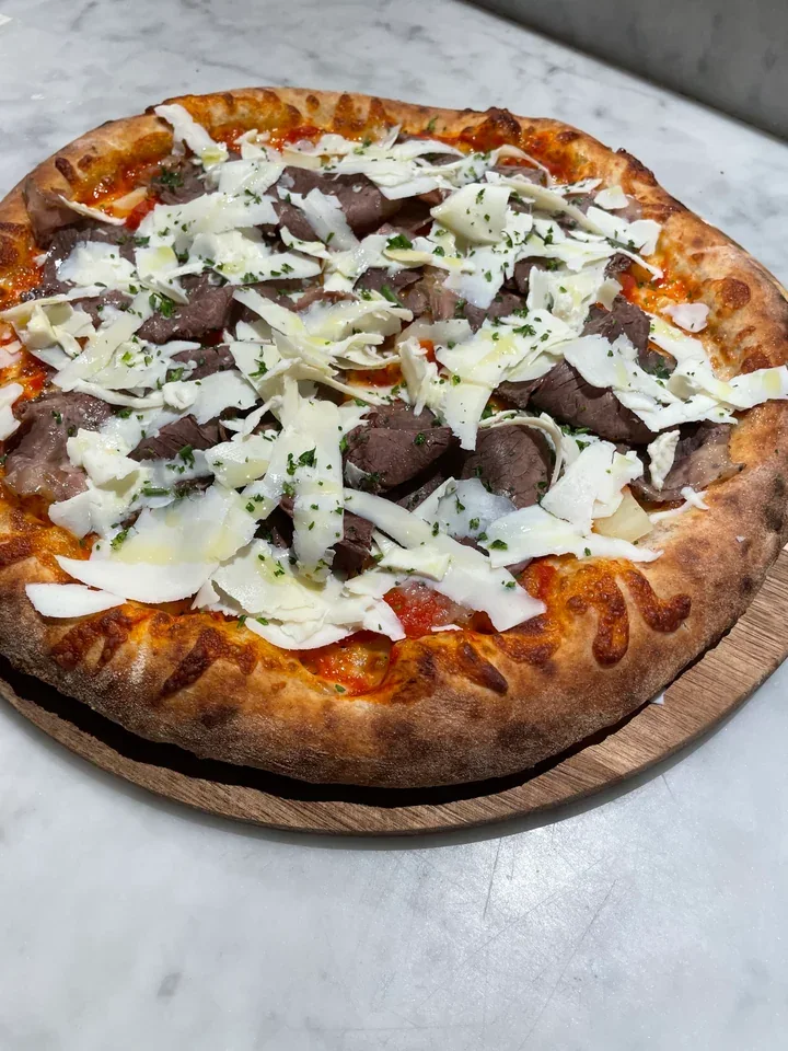 Archive view of Pizza del Pastore plated at Davanti