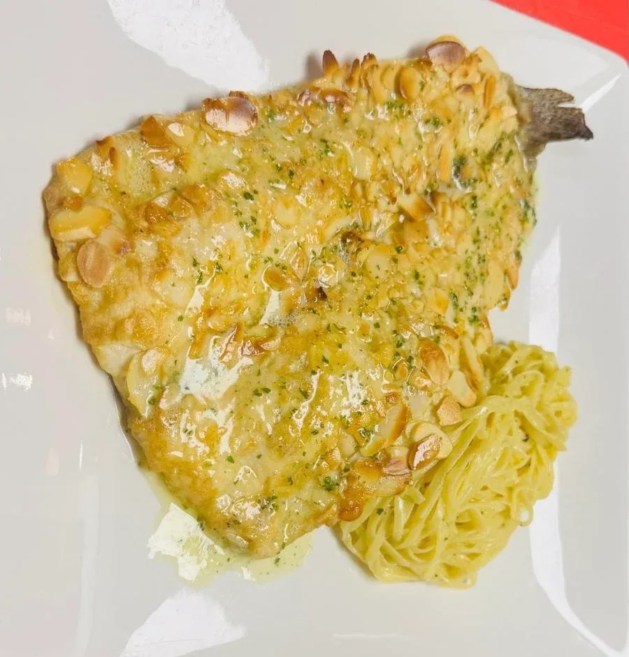 Archive view of Filetto di Trota alle Mandorle plated at Davanti