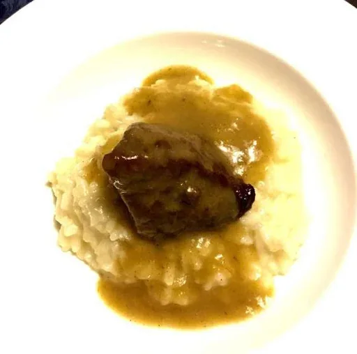 Archive view of Guancia di Vitello con Risotto plated at Davanti