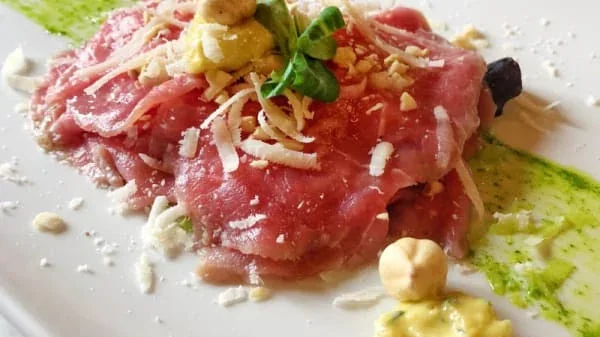 Archive view of Carpaccio di Manzo con Ricotta al Tartufo e Olio di Nocciole plated at Davanti