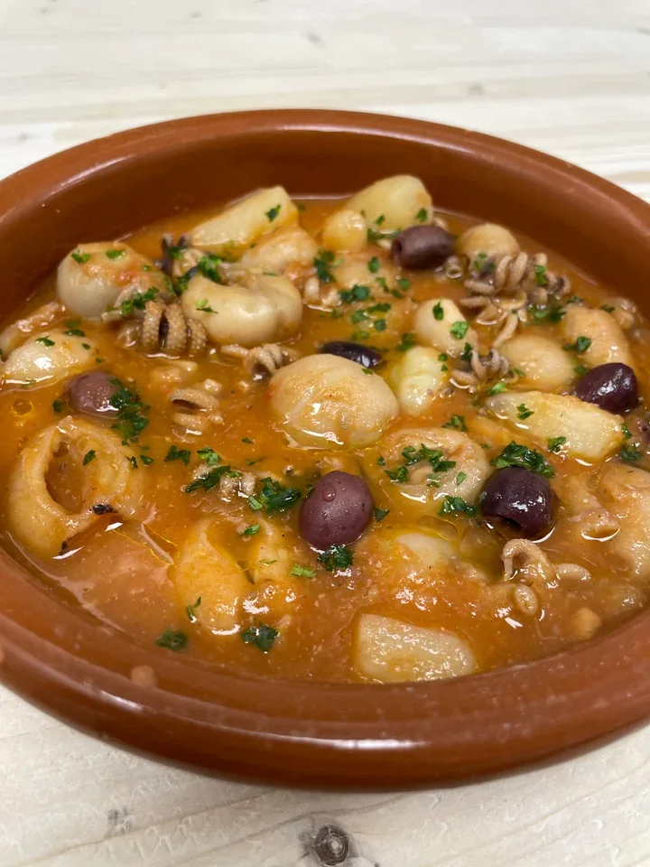 Archive view of Seppie in Brodetto alla Gradese plated at Davanti