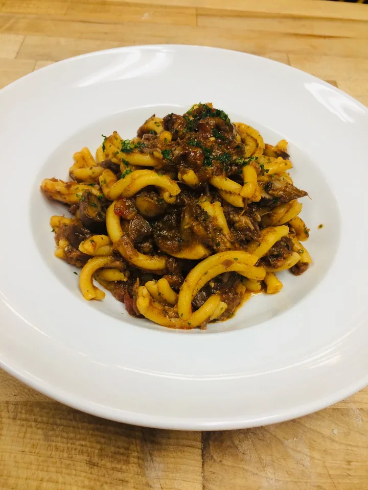 Archive view of Casarecce al Sugo di Guancia di Manzo e Funghi Cantarelli plated at Davanti