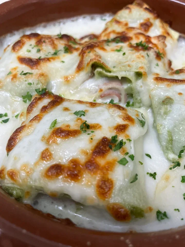Archive view of Rosette di Pasta Fresca alla Bolognese plated at Davanti