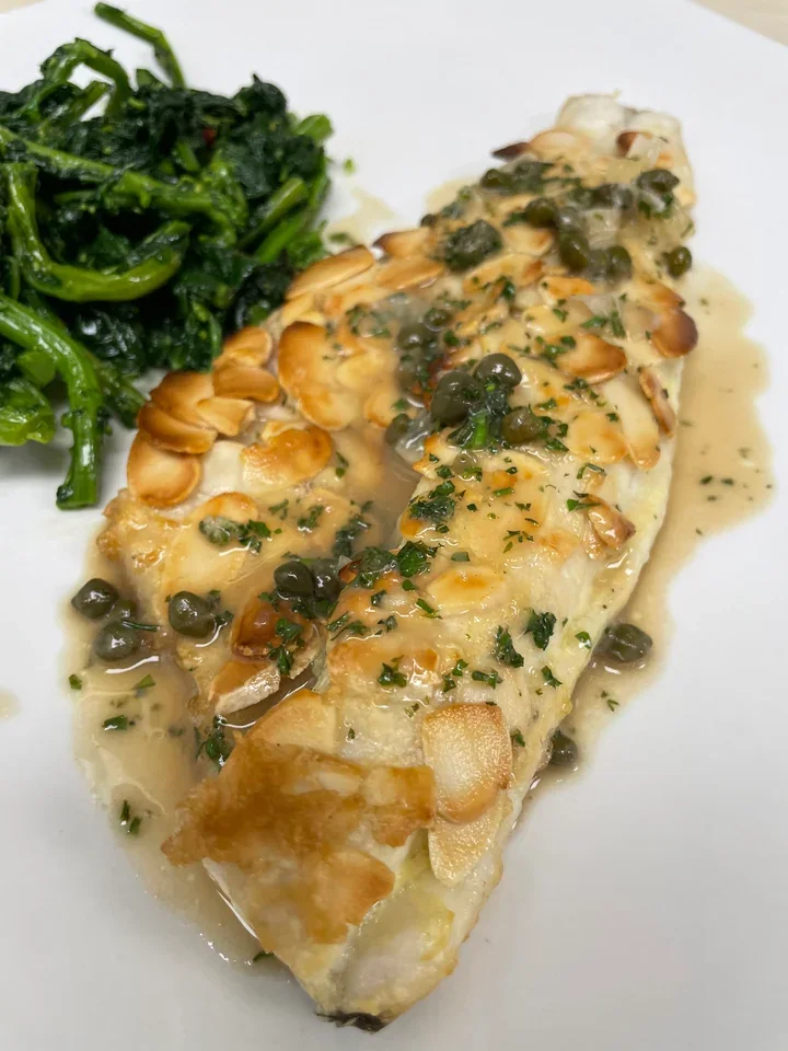 Archive view of Filetto di Branzino alle Mandorle plated at Davanti