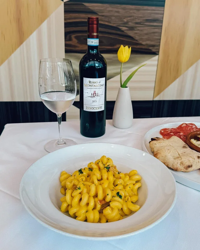 Archive view of Cavatappi con Speck e Zucca plated at Davanti