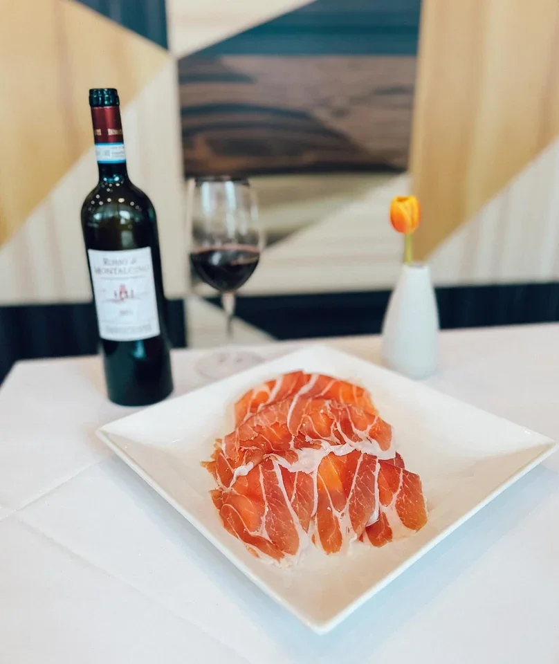 Archive view of Parma Prosciutto and Cantaloupe plated at Davanti