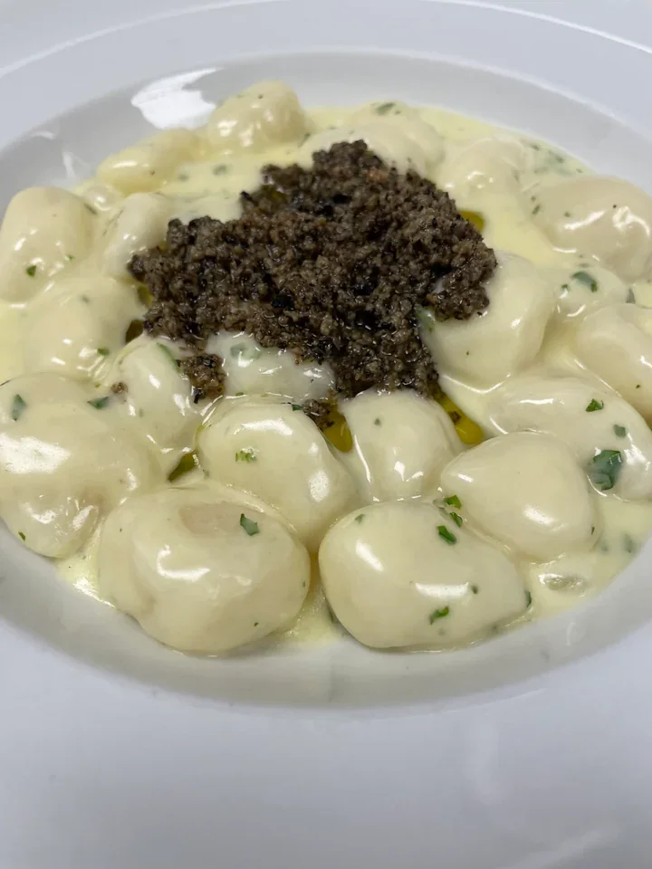 Archive view of Gnocchi al Tartufo e Squacquerone Cheese plated at Davanti