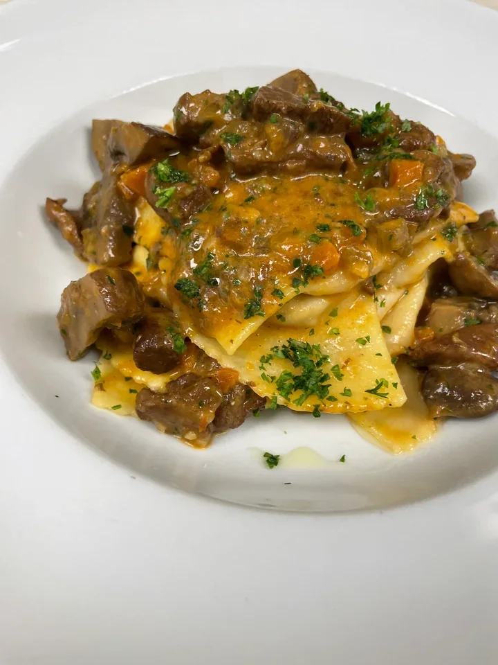 Archive view of Ravioli di Nocciole ai Funghi plated at Davanti
