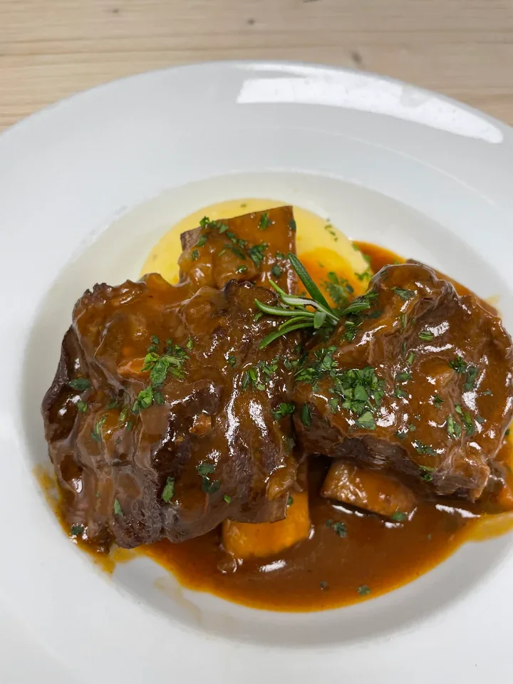 Archive view of Short-ribs Brasate alla Piemontese plated at Davanti