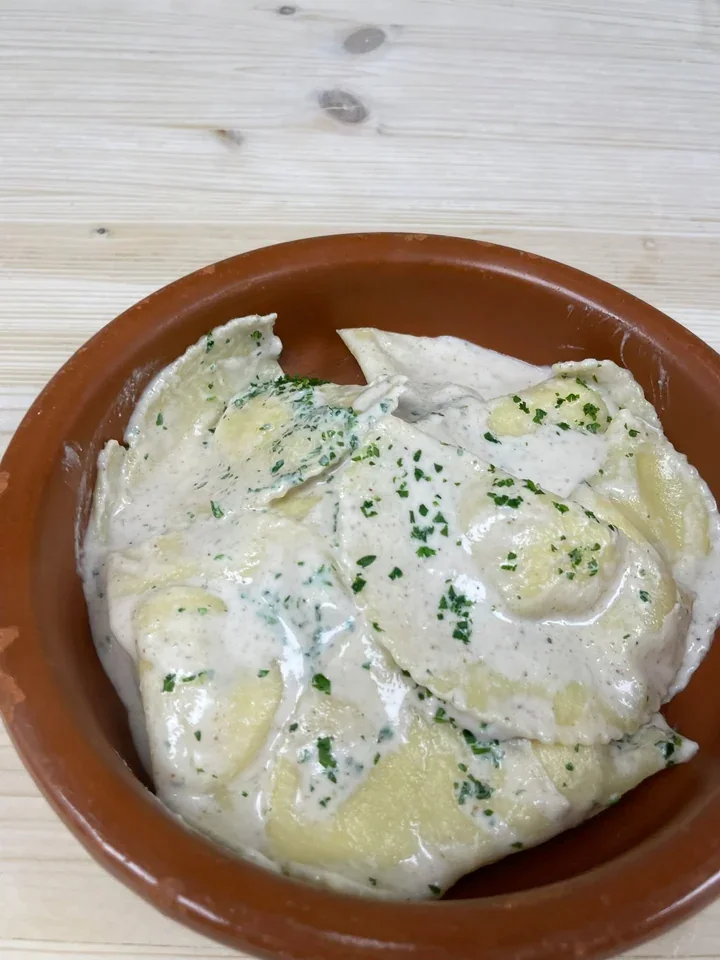 Archive view of Pansoti con Salsa di Noci alla Genovese plated at Davanti