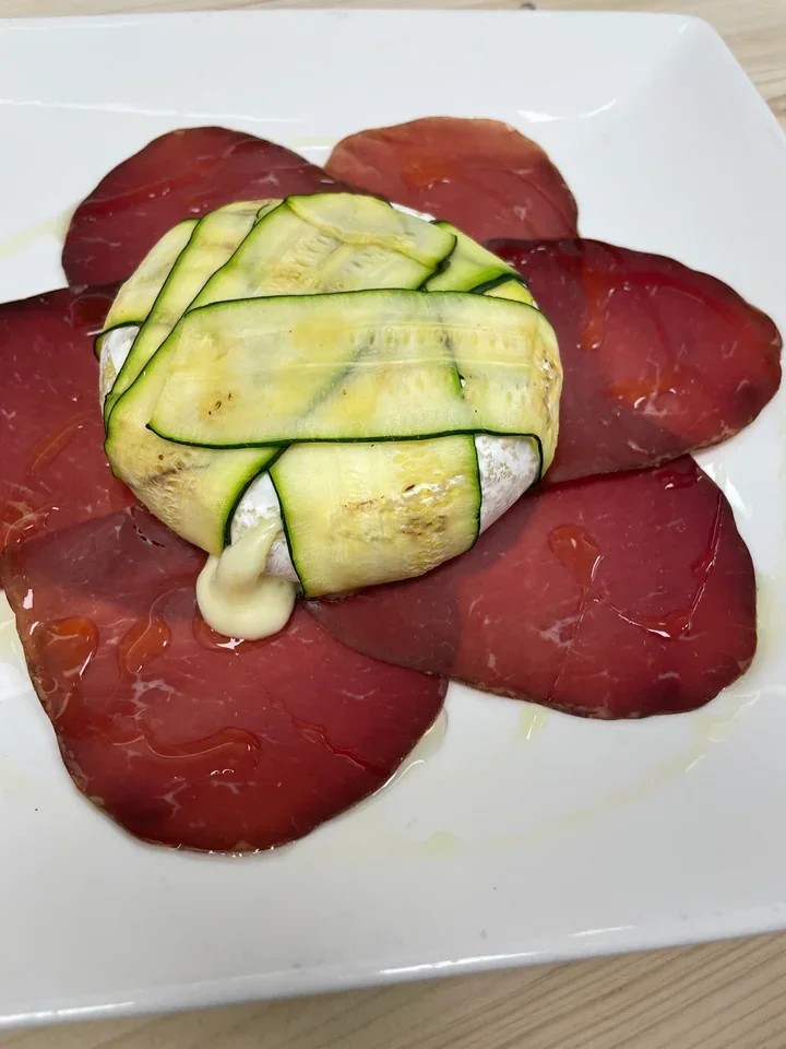 Archive view of Tomino al Forno con Zucchine e Bresaola plated at Davanti