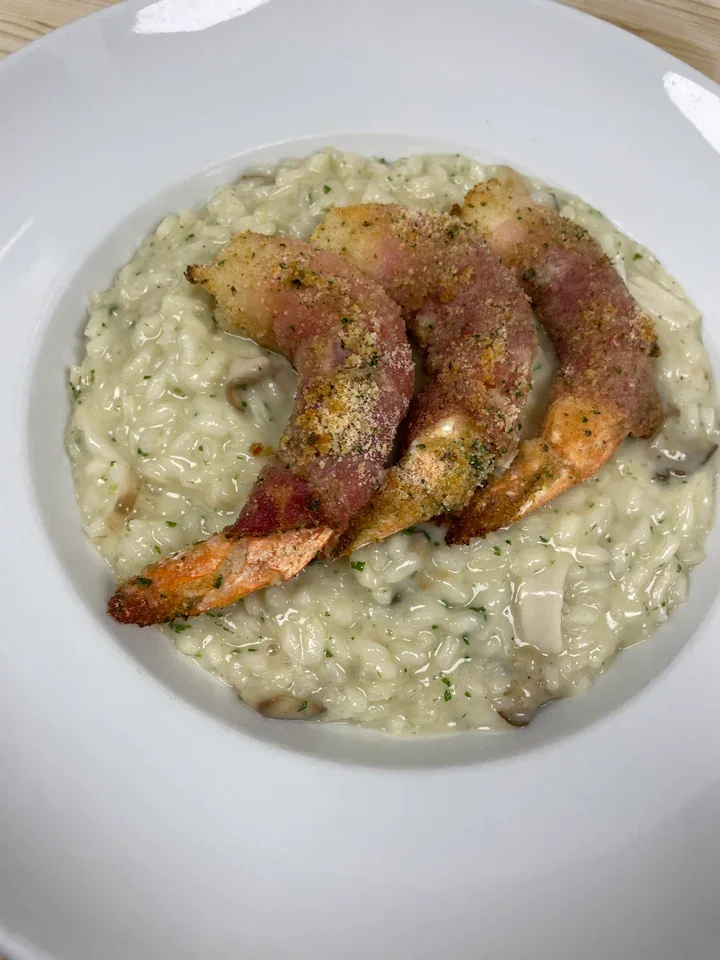 Archive view of Risotto ai Porcini e Gamberi Gratinati plated at Davanti