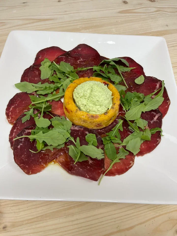 Archive view of Bresaola della Valtellina con Crema di Ricotta e Zucchine plated at Davanti