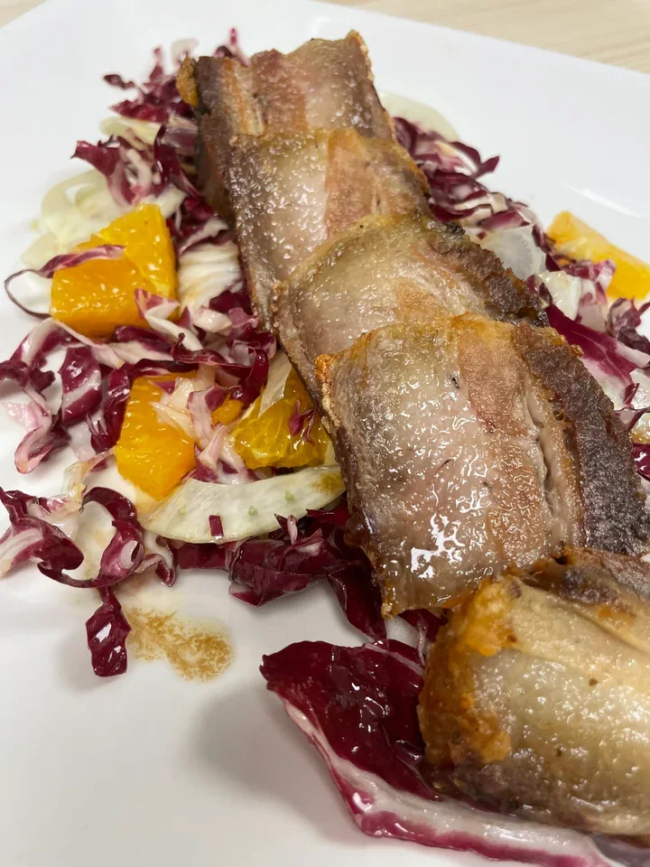 Archive view of Pancetta di Maiale in Insalata di Radicchio Rosso Finocchio e Arance plated at Davanti