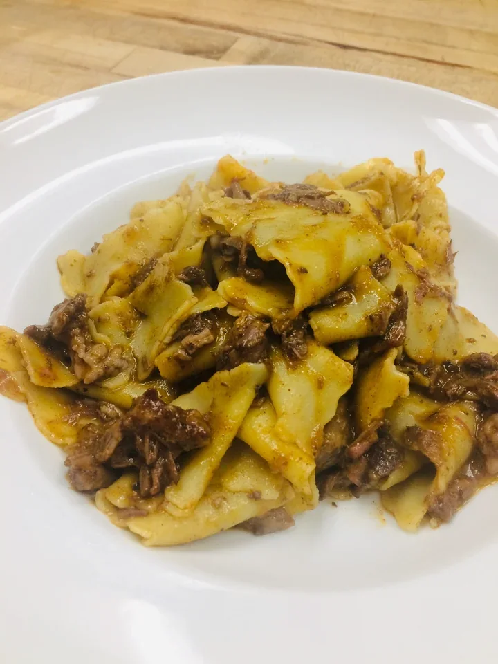 Archive view of Pappardelle con Cinghiale alla Toscana plated at Davanti