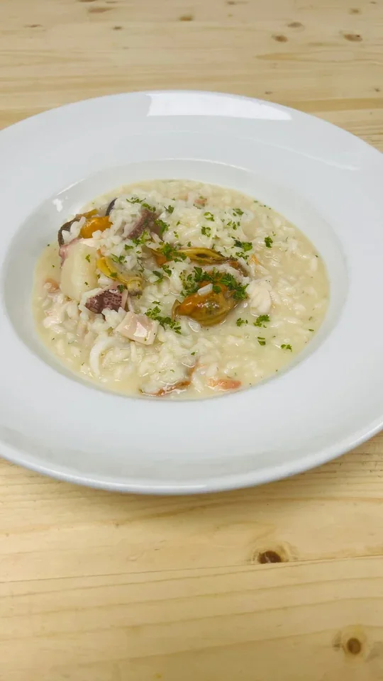 Archive view of Risotto alla Pescatora with calamari and octopus
